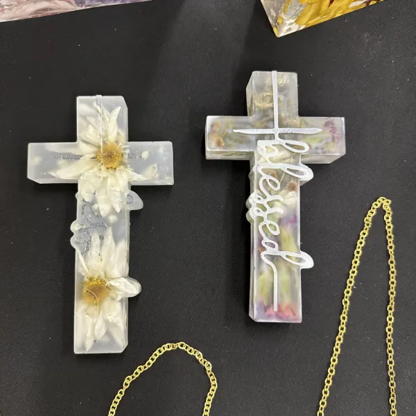 Resin cross keepsake with preserved memorial flowers
