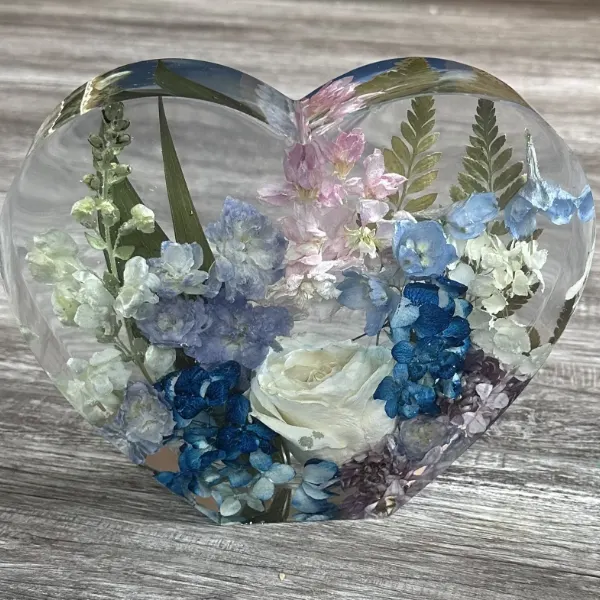 Large resin heart with preserved bouquet flowers